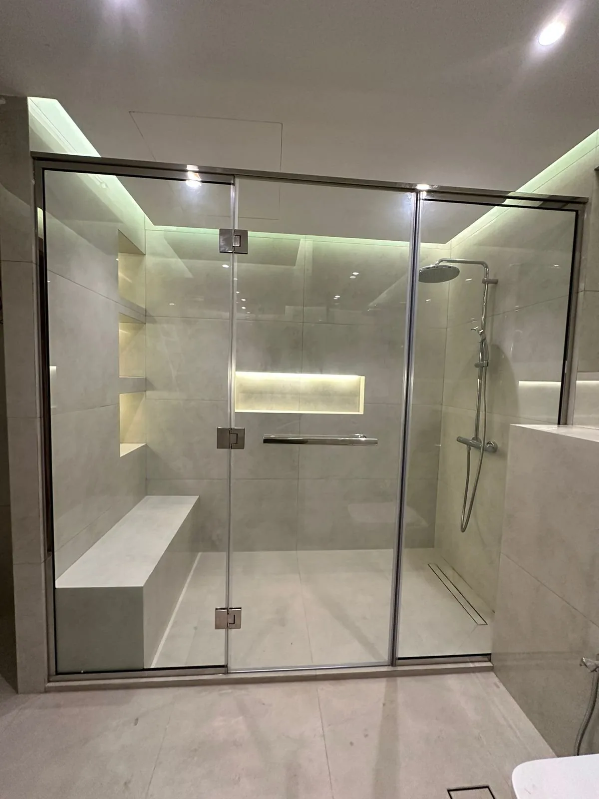 Custom shower glass installation in Dubai by Blue Lake Glass & Aluminum